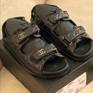 Chanel 
Black Leather Quilted Caviar Gold Chain Cc Logo Dad Sandals